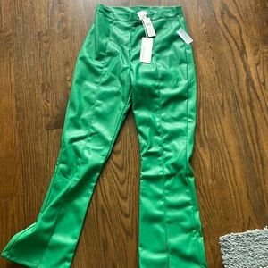 Emerald green faux leather split hem pants from Anthropologie size medium